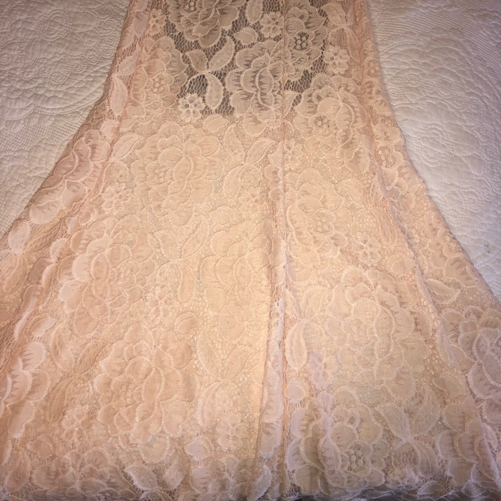 A long mermaid style lace blush pink dress